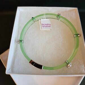 Vintage LIA SOPHIA lucite green bracelet silver beads as accent around bracelet.